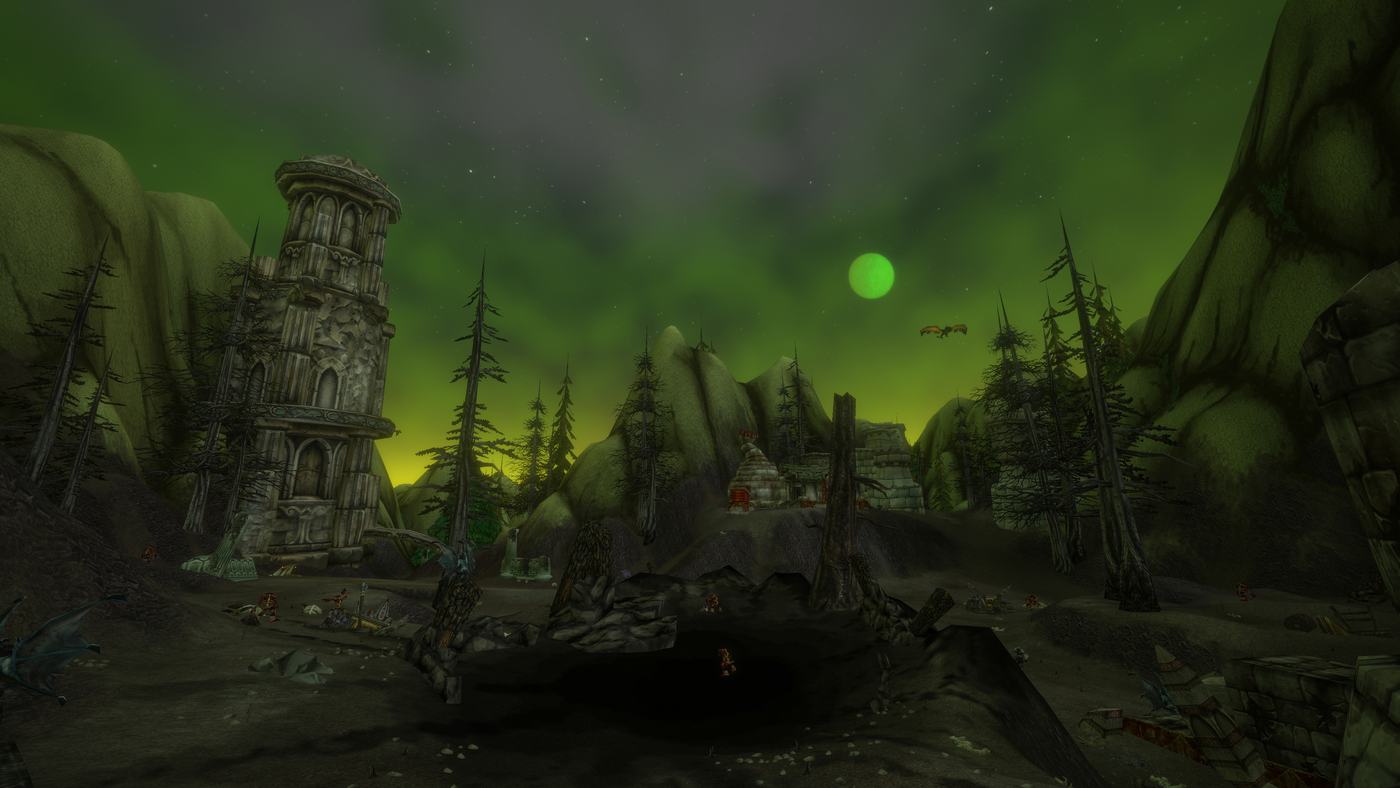 A ruined tower under a sickly green moon in Mount Hyjal, one of Forever's new zones